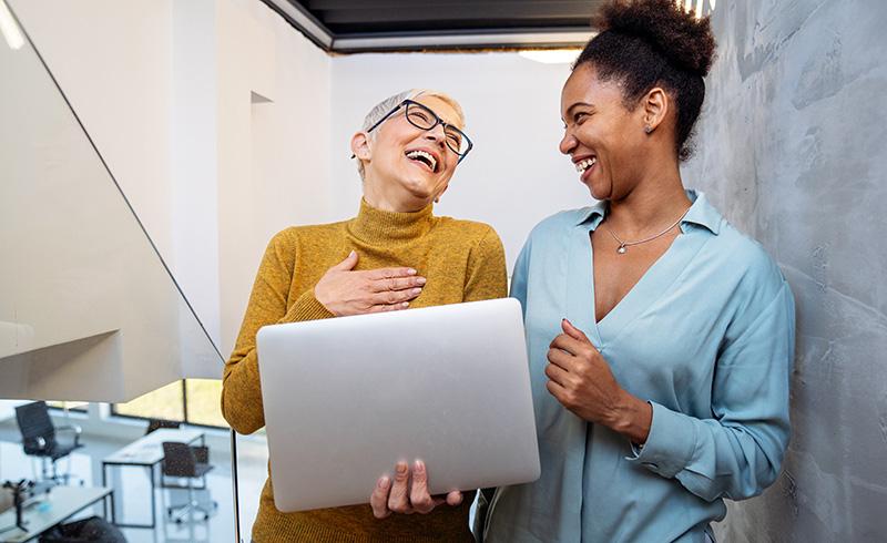 Leader coaching a team member, reinforcing a culture of continuous development.